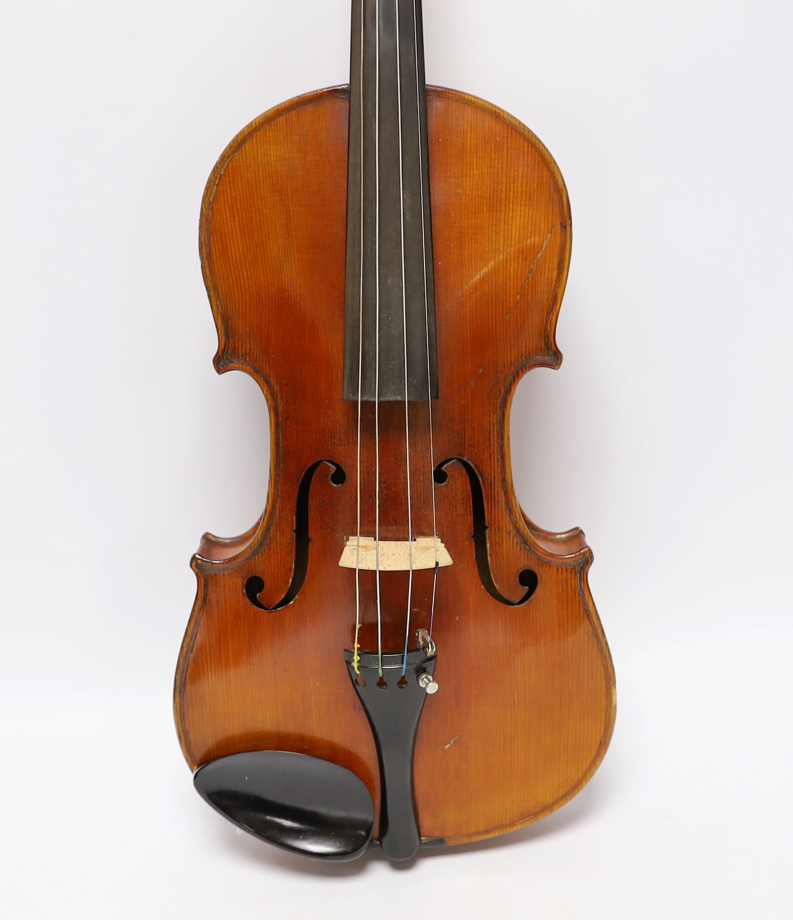 A cased early 20th century French violin, bears Strad label